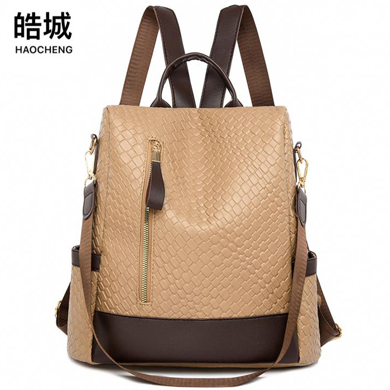 Fábrica al por mayor 2024 nuevas señoras casuales de cuero suave mochila antirrobo moda contraste color tejido mochila de viaje