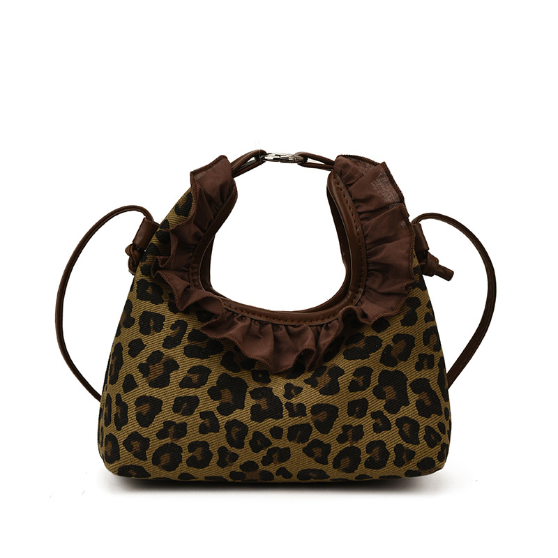 Moda coreana con patrón de leopardo para niñas bolsos de encaje exquisitos mini bolsos de hombro para bebés bolsos de comercio exterior transfronterizos para niños