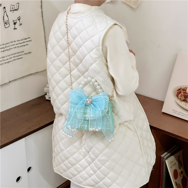 Bolsos de moda de moda para niños, arco de arco, nuevo bolso, cambio de chicas, mochila transfronteriza