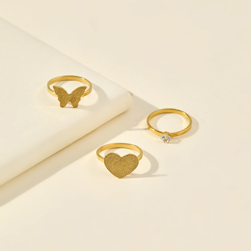 Cross-border new titanium steel ring for women, niche high-end golden diamond inlaid luxury love butterfly stainless steel jewelry manufacturer