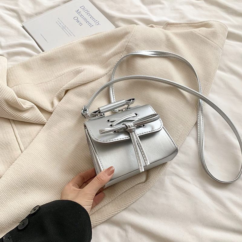 Diseño coreano de nicho bolso de mujer 2024 mini personalidad versátil bolso de moda arco de hombro bolso pequeño