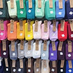 Purchasing agent for Korean Dongdaemun imported solid color thin thread candy color versatile women's cotton socks mid-tube pile socks