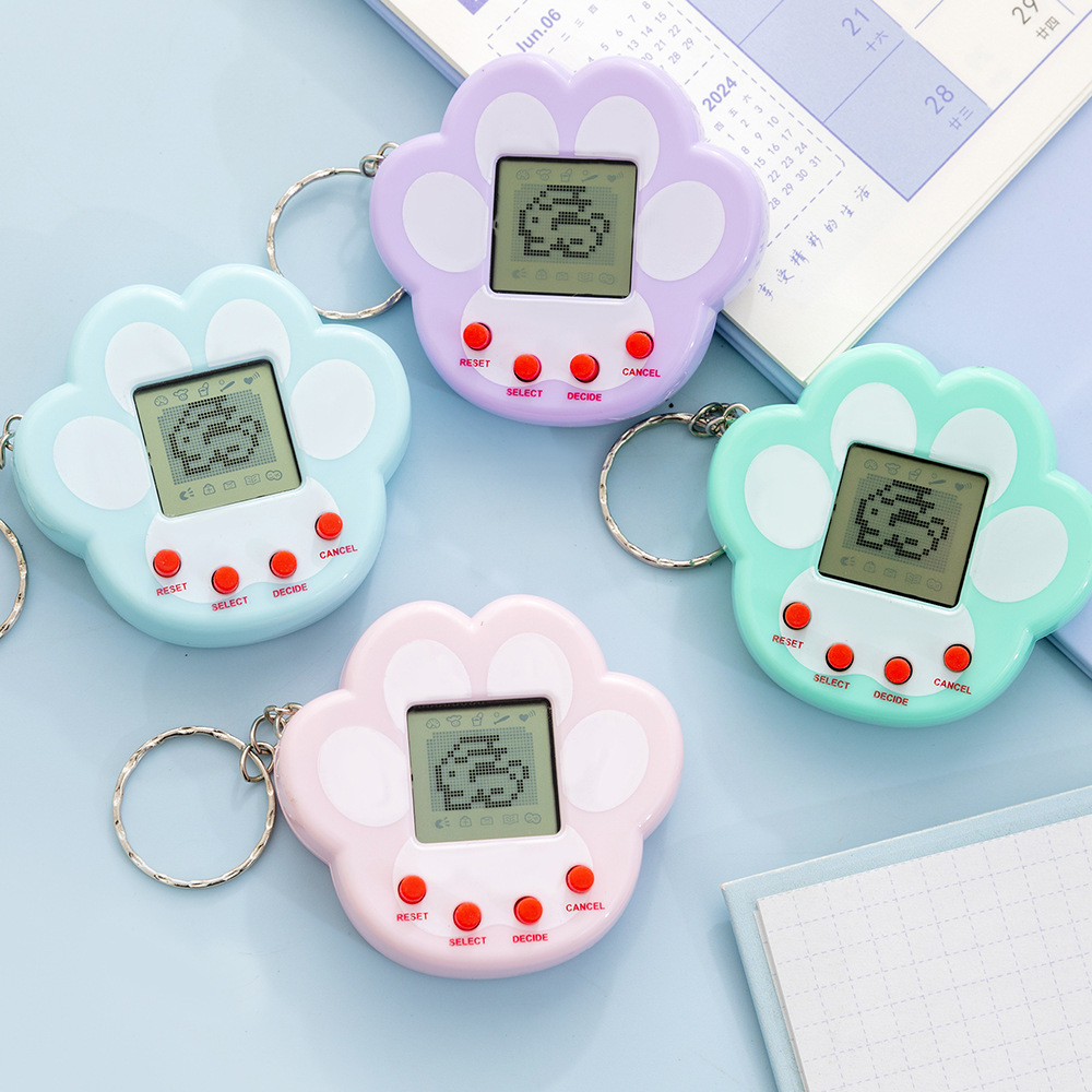 Máy chơi game thú cưng điện tử mini cầm tay ngoại thương, đồ chơi phát triển ảo tương tác, móc khóa