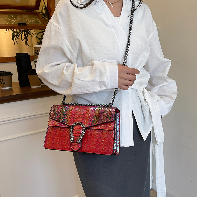 Bolsa de cadena de textura transfronteriza 2025 verano nuevo bolso femenino patrón de serpiente patrón de avestruz bolso de hombro bolso de mensajero de color de contraste de alta calidad