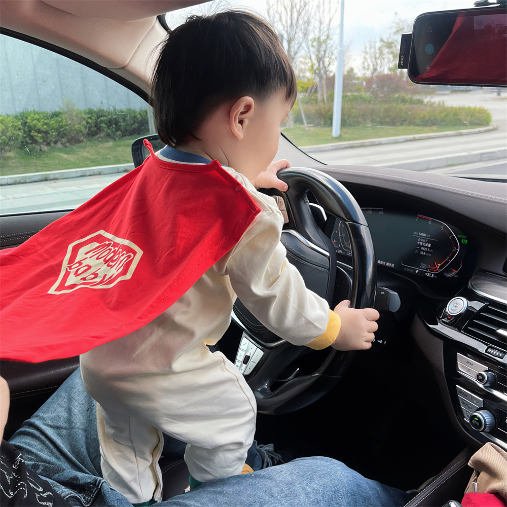 Primavera 2024 ropa de bebé moderno bebé pequeño Superman mameluco moda estilo mono Outwear capa