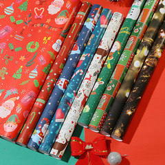 外国貿易のクリスマスの贈り物の包装紙は銅版の紙の現物を厚くして卸売りします。