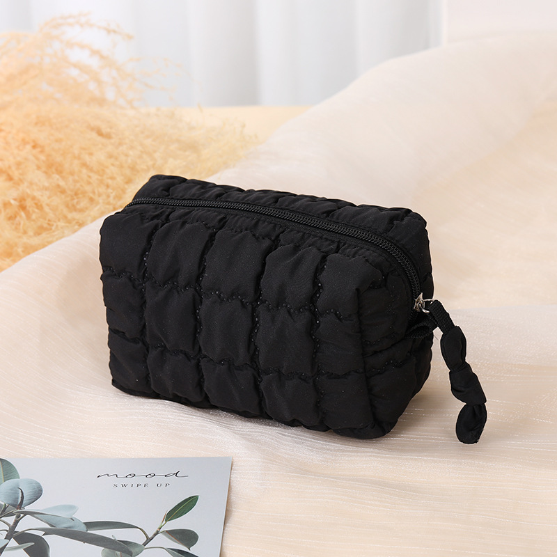 Nueva bolsa de cosméticos octogonal de otoño e invierno para mujer, bolsa de almacenamiento con relleno de plumón portátil portátil de alta gama