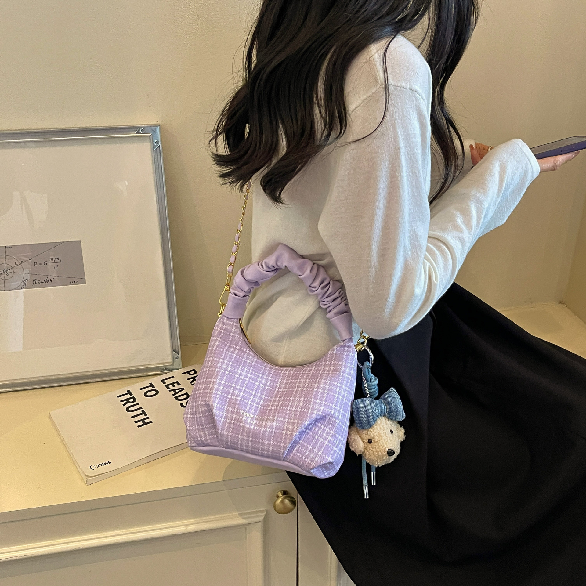 Bolso de mano popular de verano para mujeres 2026 nuevo estilo versátil cadena diaria bolso de hombro sensación de bolso plegado super caliente