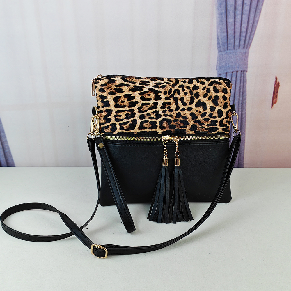 Bolso de leopardo de mujer bolso de moda europeo y americano nuevo bolso inclinado de hombro único bolso de color de choque ultrafino bolso de mano con borlas