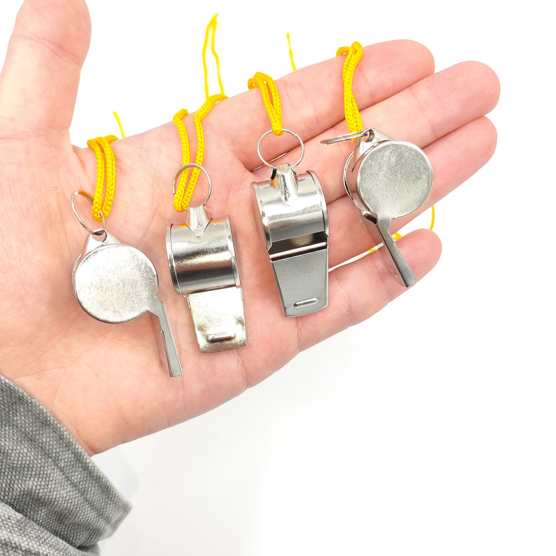 Silbato de hierro con borde de metal, silbato de acero inoxidable, supervivencia al aire libre, competencia especial de alta frecuencia, juguetes para niños al por mayor