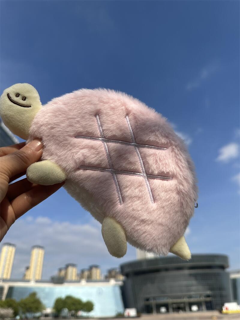 オリジナルのかわいい亀の変な表情シリーズのぬいぐるみの座布団の筆袋の小銭入れの首のイヤホンの包みのプレゼント