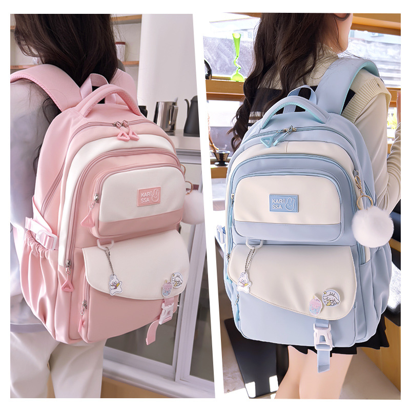 2024 nuevo lindo casual niños Escuela Primaria mochila 3-6 grado reducción de carga Oxford tela mochila para las mujeres de secundaria