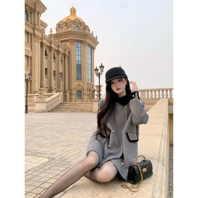 Sophisticated Chanel-inspired, stylish double-breasted wool coat with stand-up collar and color-blocked design, exuding a slimming and elegant vibe.