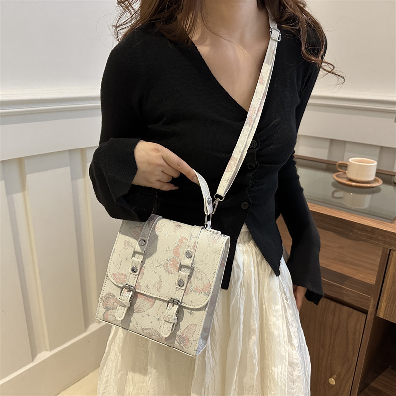 2024 nueva impresión universal mini bolso nuevo estilo chino chino de alto nivel de estilo extranjero nicho mochila mujer