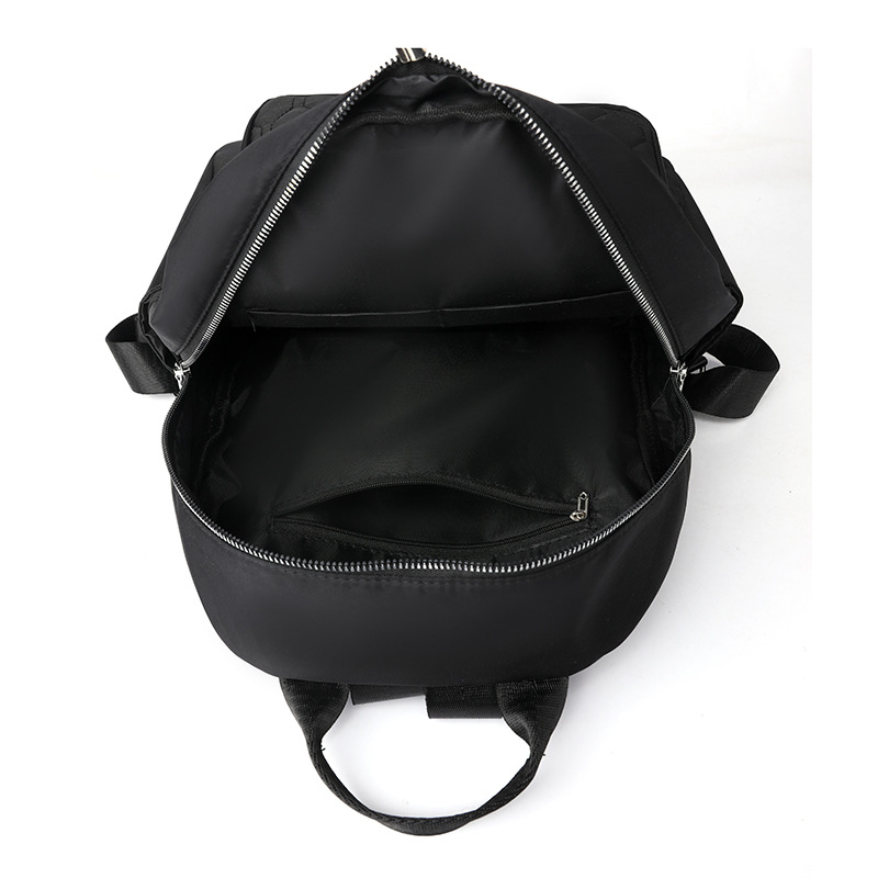 Fábrica al por mayor 2023 nueva mochila de nailon casual para mujer, línea de bordado de moda, mochila de viaje de gran capacidad, mochila escolar