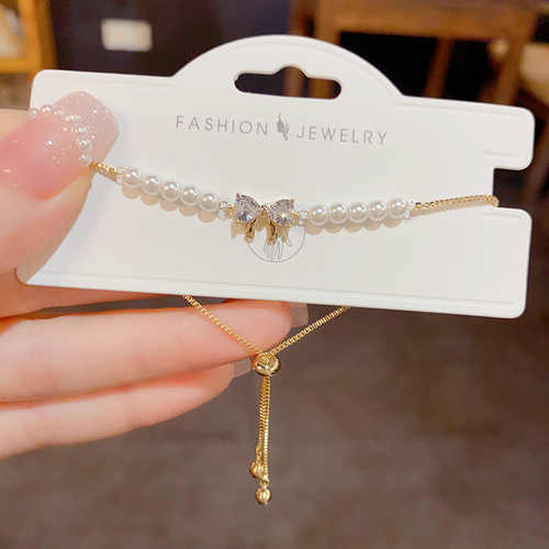 Summer new style, light luxury and sweet bow pearl pull-out bracelet, high-end, simple and versatile bracelet