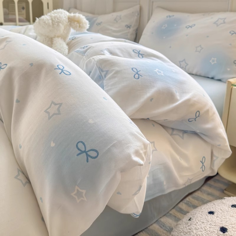 Cama de hilo de doble capa de algodón estilo ins Juego de cuatro piezas Funda de edredón de algodón puro para niños 2025 Nuevo juego de tres piezas de dormitorio de sábanas