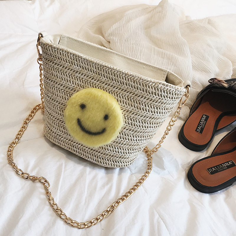 2021 Spring new pattern Female bag Smiling face zipper Straw bag bucket fashion chain weave Inclined shoulder bag