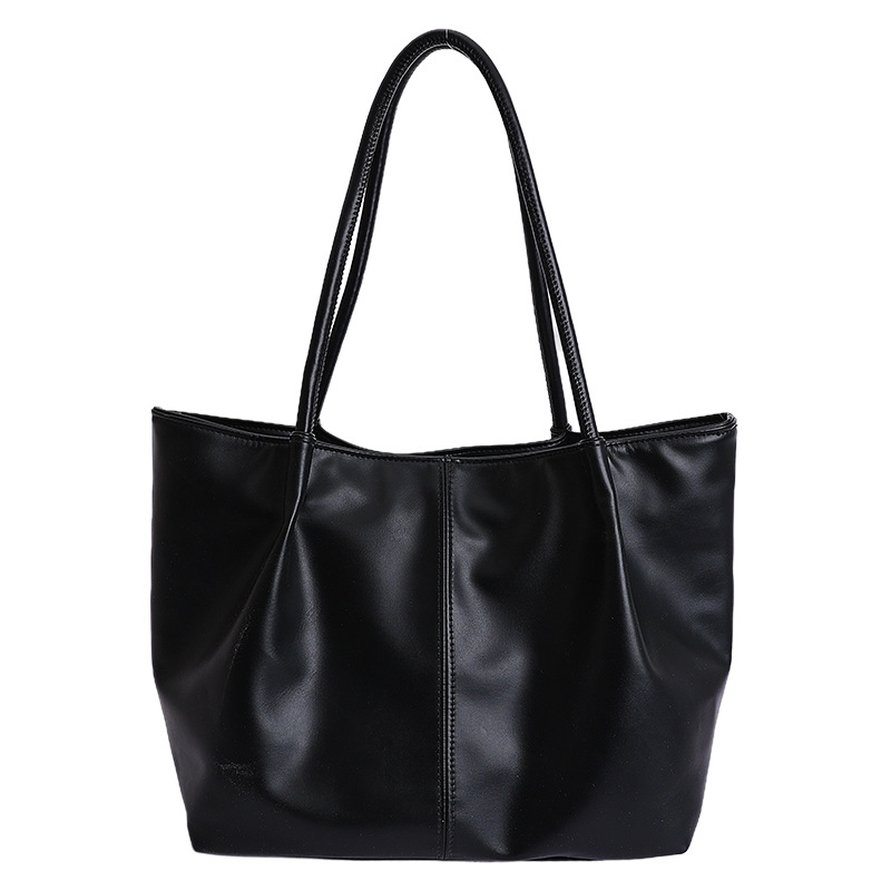Bolso 2026 nuevo retro bolso de hombro de transporte de gran capacidad bolso de mujer simple y versátil bolso de brazo portátil