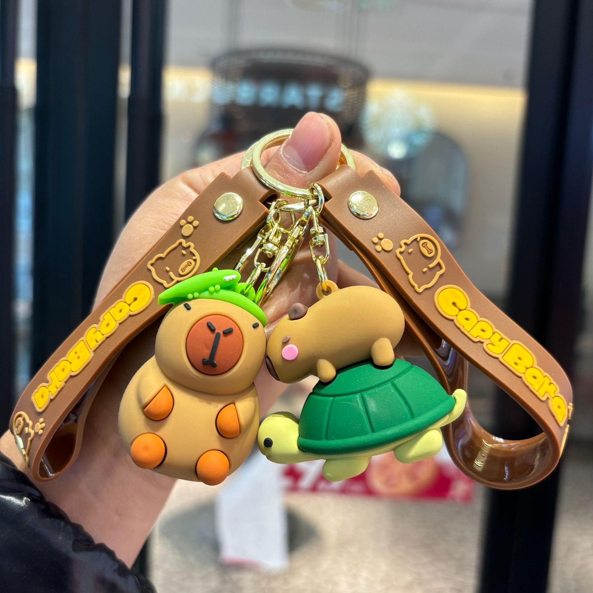 Transfronterizo Kapibara llavero Dolphin mochila colgante llavero de coche muñeca máquina pequeña regalo al por mayor