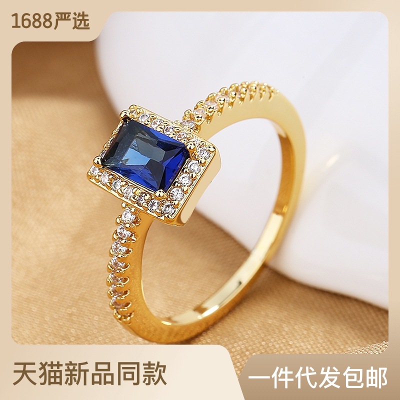 multicoloured ring with stone with zircon