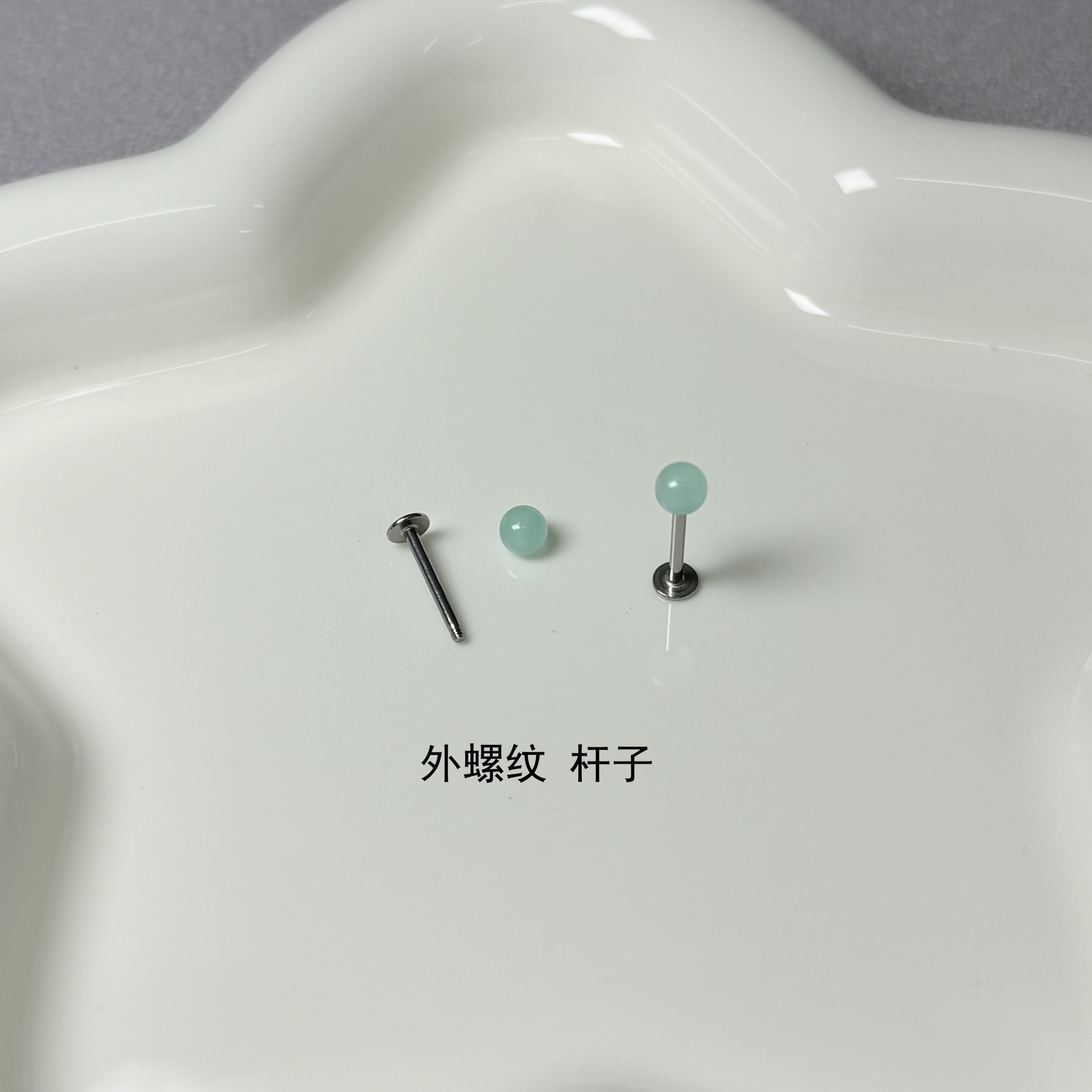 Pointed labret stud close-up product detail