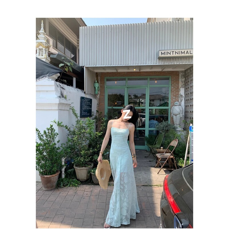 Beach vacation gentle style floral print camisole dress, new summer elegant and chic waist-cinching long dress for women 2026 Beach vacation gentle style floral print camisole dress, new summer elegant and chic waist-cinching long dress for women 2026