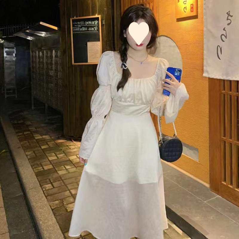 纯欲连衣裙女2025秋季新款露腰蝴蝶结绑带长袖长款A字裙潮流