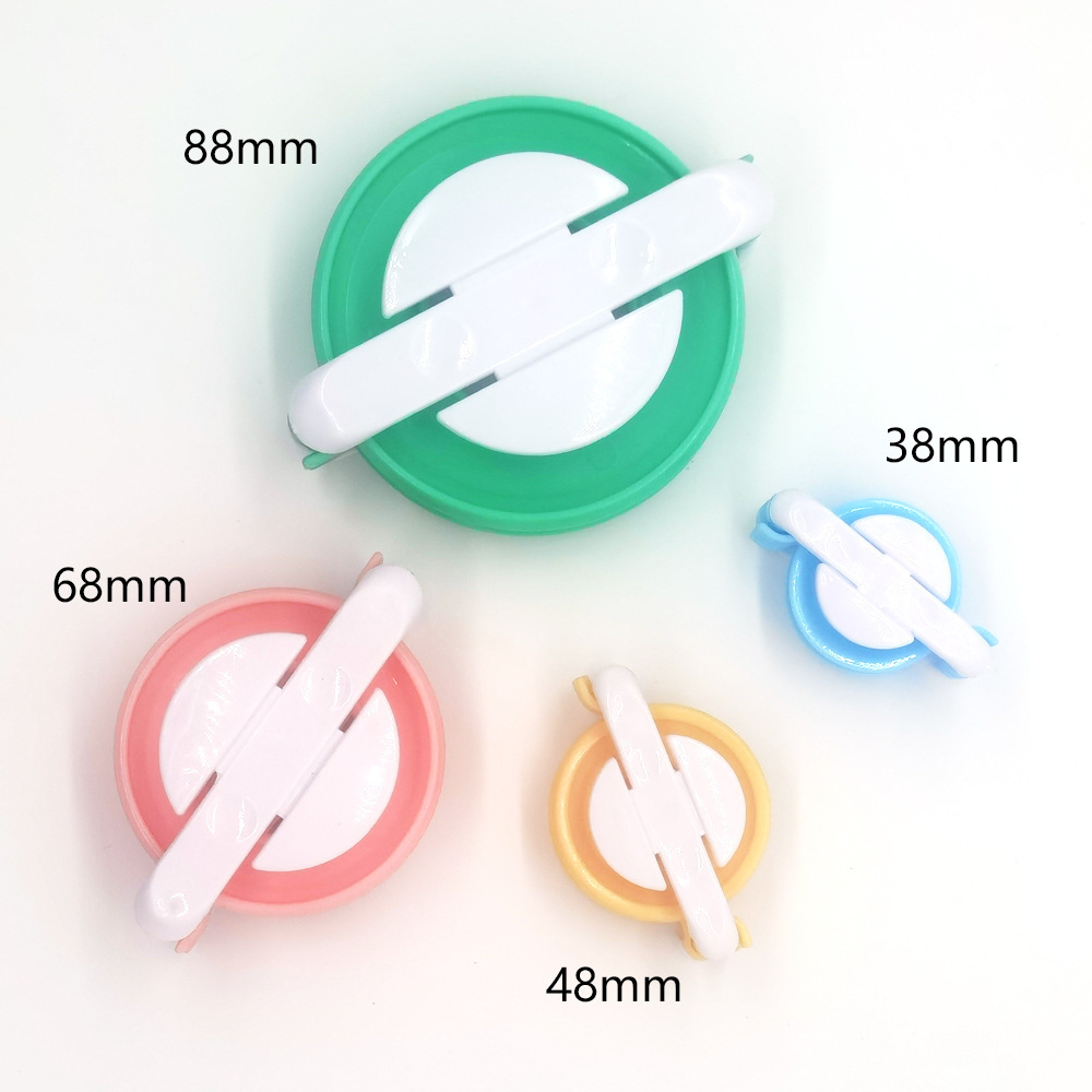 Herramientas de tejido de agujas de suéter transfronterizas PP de plástico, máquina de fabricación de bolas de lana redondas, un conjunto de 4 máquinas de fabricación de bolas de lana