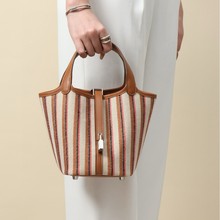 手工缝制2025新款时尚刺绣条纹拼色菜篮子水桶包百搭通勤手提包