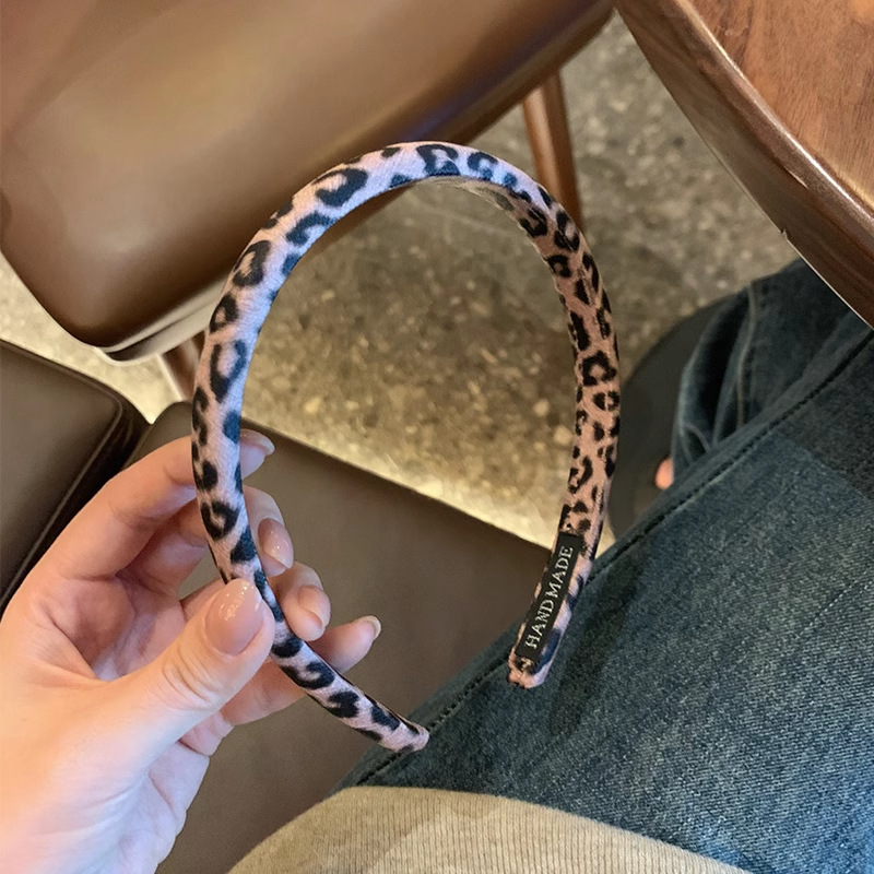 Nuevo estilo coreano de alta calidad estampado de leopardo hermoso banda de tela esponja textura de moda banda de cabeza de cráneo alto accesorios para el cabello
