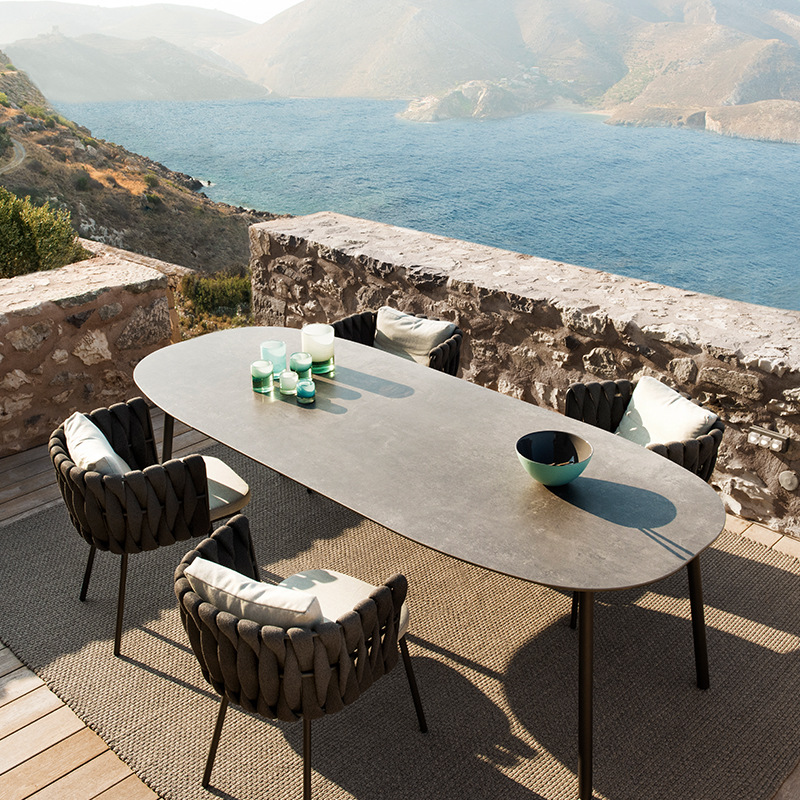 Mesa y silla de cordón al aire libre patio jardín balcón al aire libre mesa de comedor de hotel simple villa combinación silla de caña