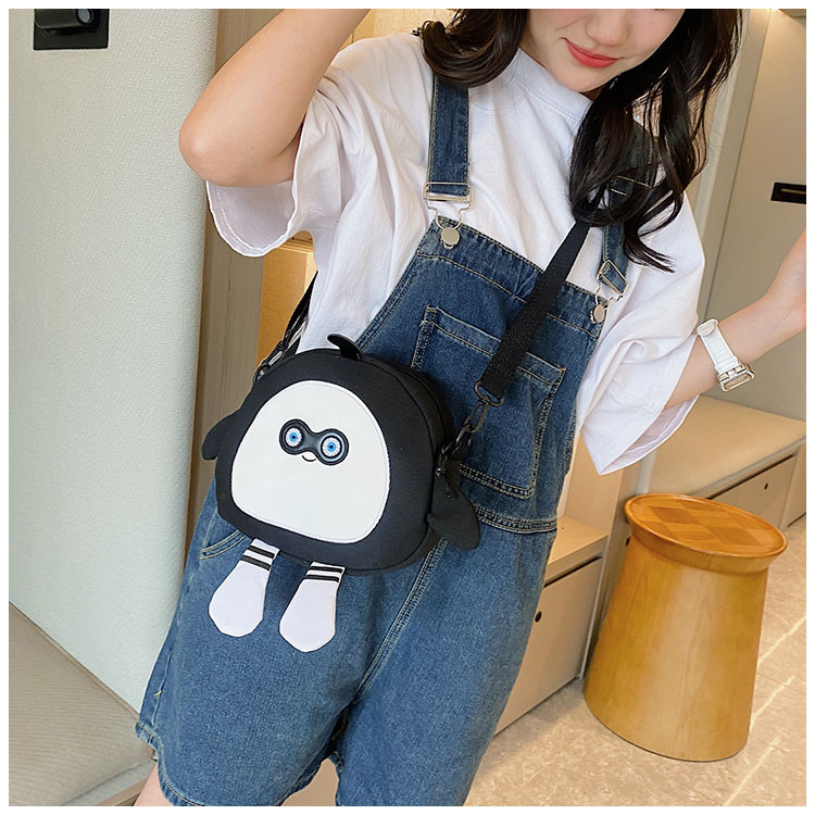 The new 2024 children's egg-shaped party backpack is a cute cartoon canvas single-shoulder bag and a fashionable and stylish small backpack undefined