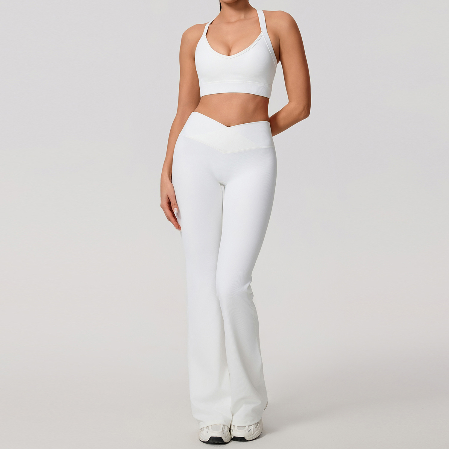 Europa y América sexy cruzada belleza de espalda deportiva al aire libre chaqueta con cremallera piernas anchas cintura alta y largo conjunto de pantalones de calzado 7005