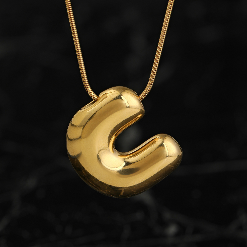 Colgante único venta cruzada de burbujas de fundición 26 collares de letras inglesas accesorios colgante DIY joyas de acero inoxidable
