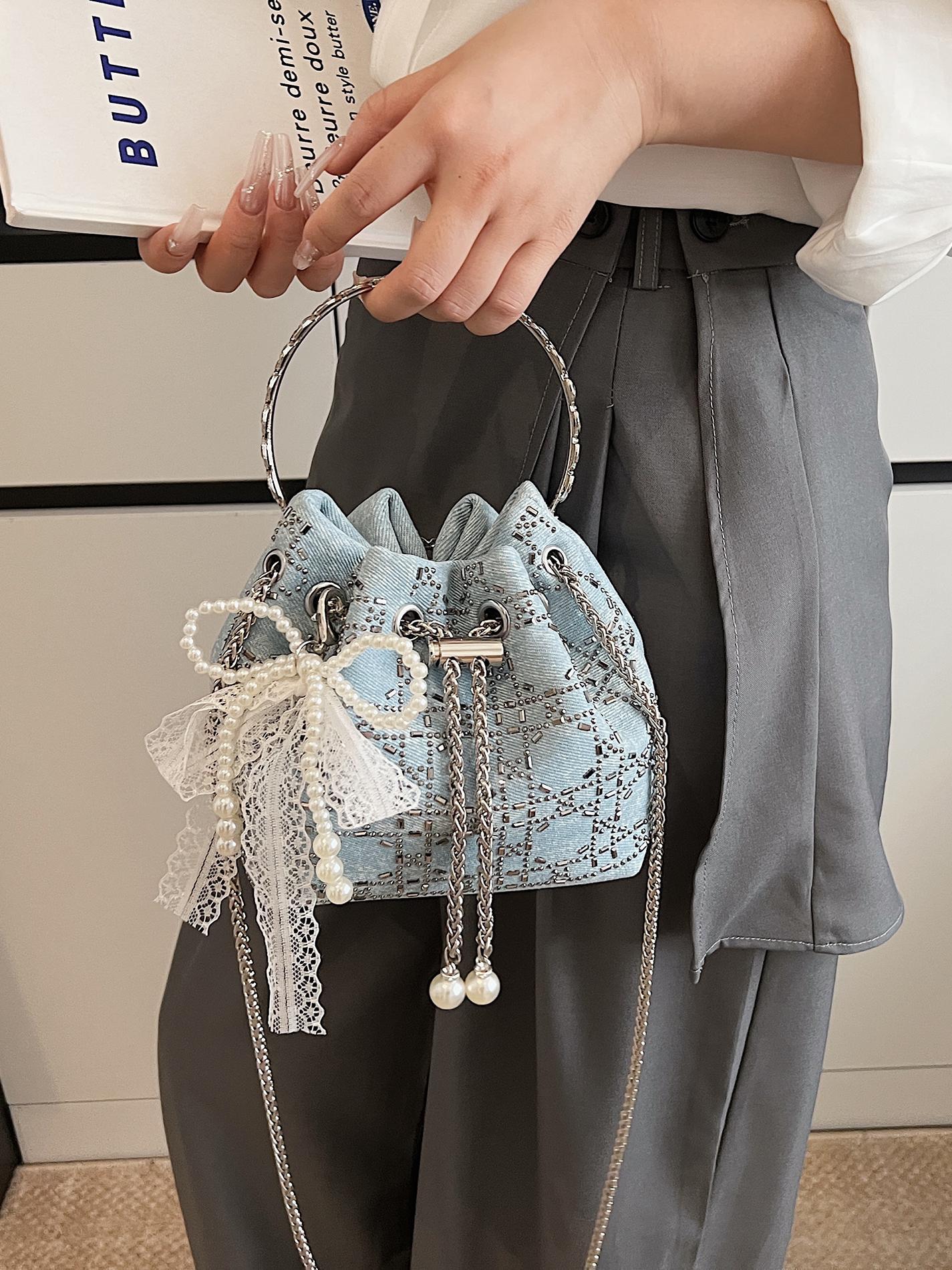 Verano popular taladro caliente bolso de cubo de mano mujer 2025 nuevo estilo coreano denim casual mochila para trabajar