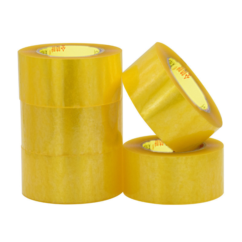 Mayorista caja de cinta adhesiva transparente alta tenacidad alta adhesiva empaque expreso papel de sellado amarillo caja de cinta adhesiva ancha tela de sellado de gran volumen