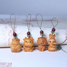 崖柏木雕十二生肖钥匙扣手机挂件九华山谛听云南瓦猫工艺品批发