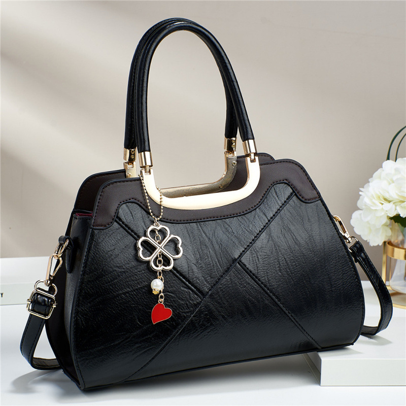 Temperamento sensación de mochila de gran capacidad bolsos de mano versátiles moda simple bolsos de hombro casuales bolsos transfronterizos