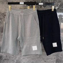 淘宝微商实代理供货夏季新款TB蜂巢暗纹短裤男女同款四道杠五分裤