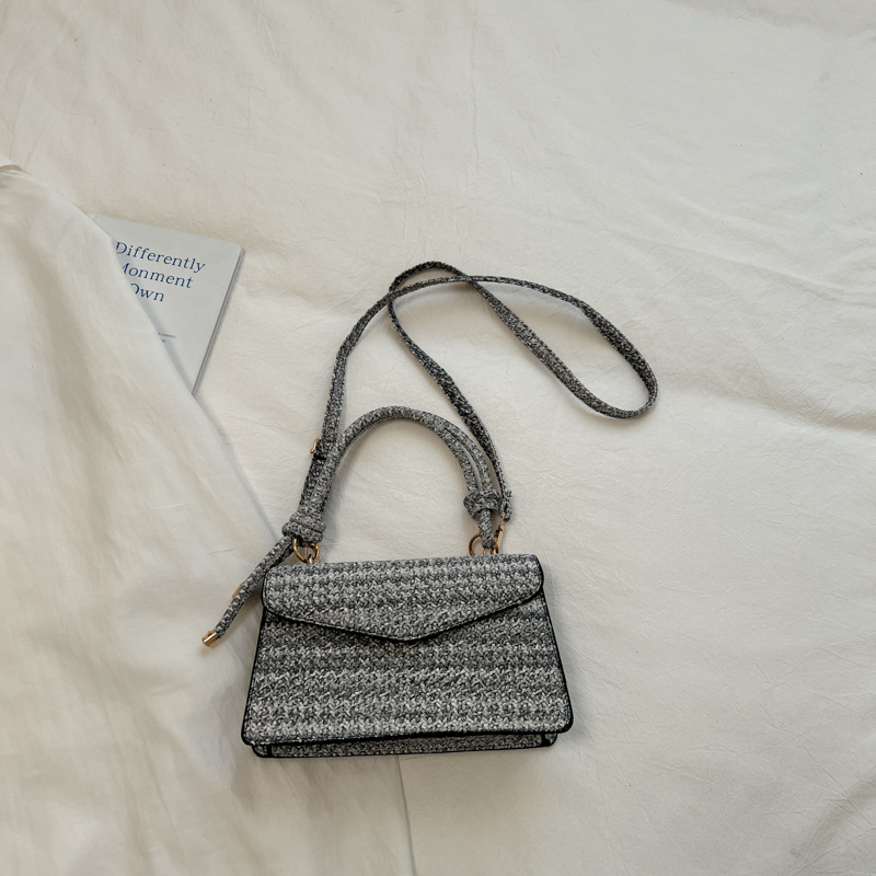 Bolsos de mano artesanal de estilo nacional nuevos nichos de diseño bolsas de cadena rayas arco iris extranjero bolsas de hombro