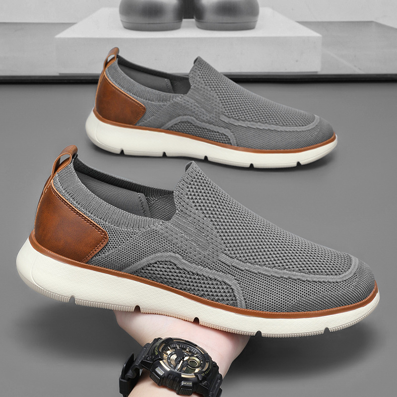 Nuevos zapatos de moda casuales retro transfronterizos de gran tamaño transpirables de malla voladora para niños con un pie zapatos de hombre ligeros y antideslizantes