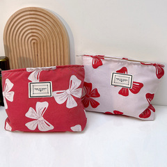 Portable makeup bag with bow print storage bag for women, miscellaneous cosmetic and skincare storage bag, wholesale makeup bag