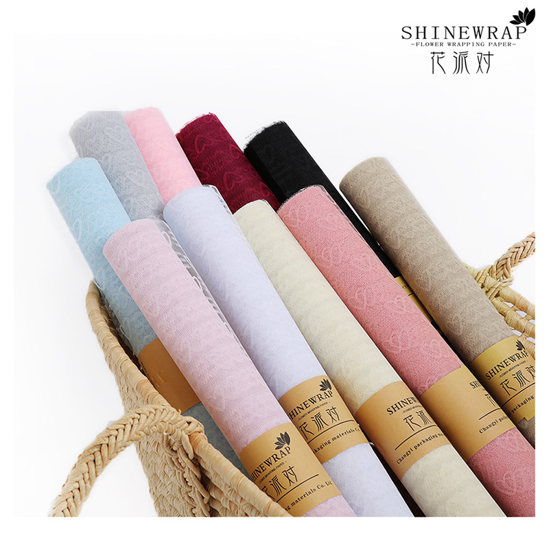 Fábrica de fiestas de flores al por mayor nuevo amor Jacquard flor envasado hilo de malla florista de color sólido