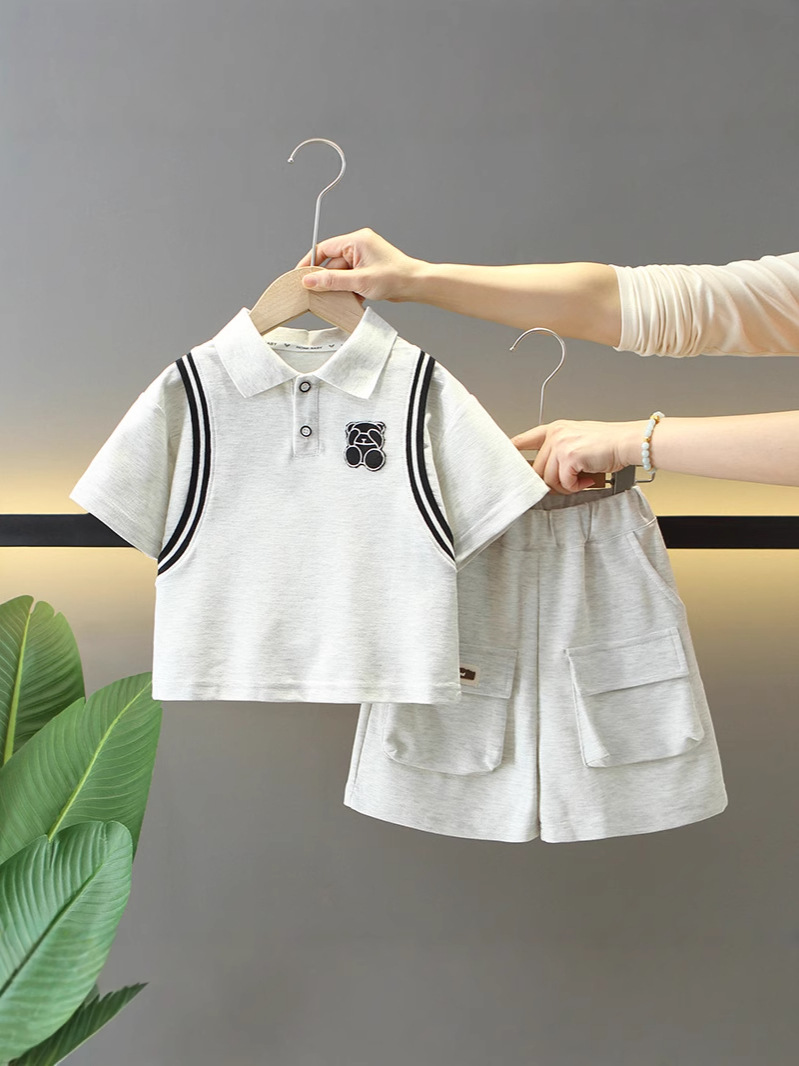 7880 traje de verano para niños 2025 nueva camisa POLO de manga corta para niños de dos piezas ropa de moda de verano para bebés