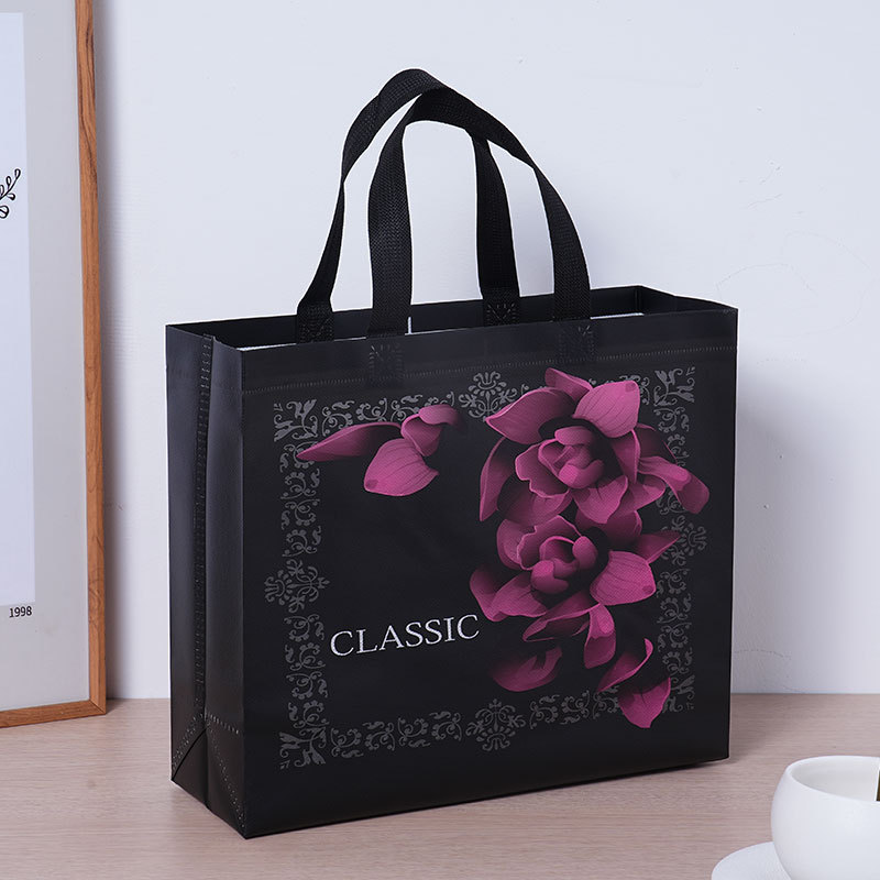 Embalaje de ropa roja bolsas de compras clásicas bolsas de mano no tejidas estereoscópicas de moda impresión en color de película - rosa negra