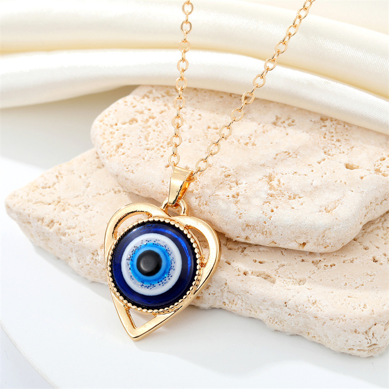 CrossBorder Sold Jewelry Retro Personality Metal Hollow HeartShaped Devil Eye Necklace Turkish Blue Eye Clavicle Chainpicture4