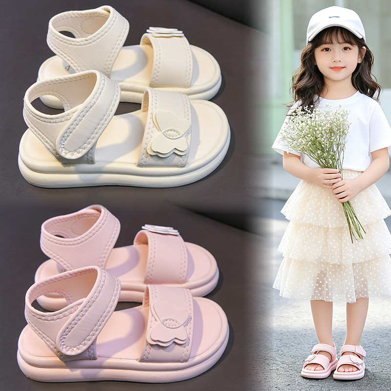 Zapatos casuales de moda de niñas versátiles 2026 verano nuevos niños sandalias de dedos abiertos huecos zapatos de princesa mariposa