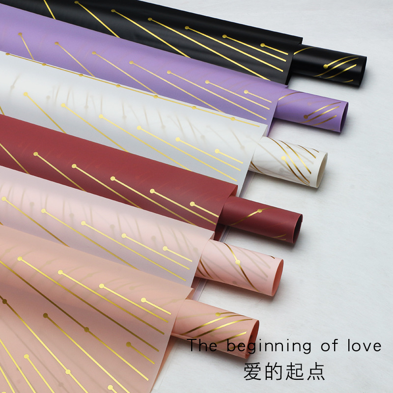 Huaxi transfronterizo amor punto de partida de papel de embalaje de flores Hansu impresión de hilo de oro impermeable papel de niebla florista al por mayor