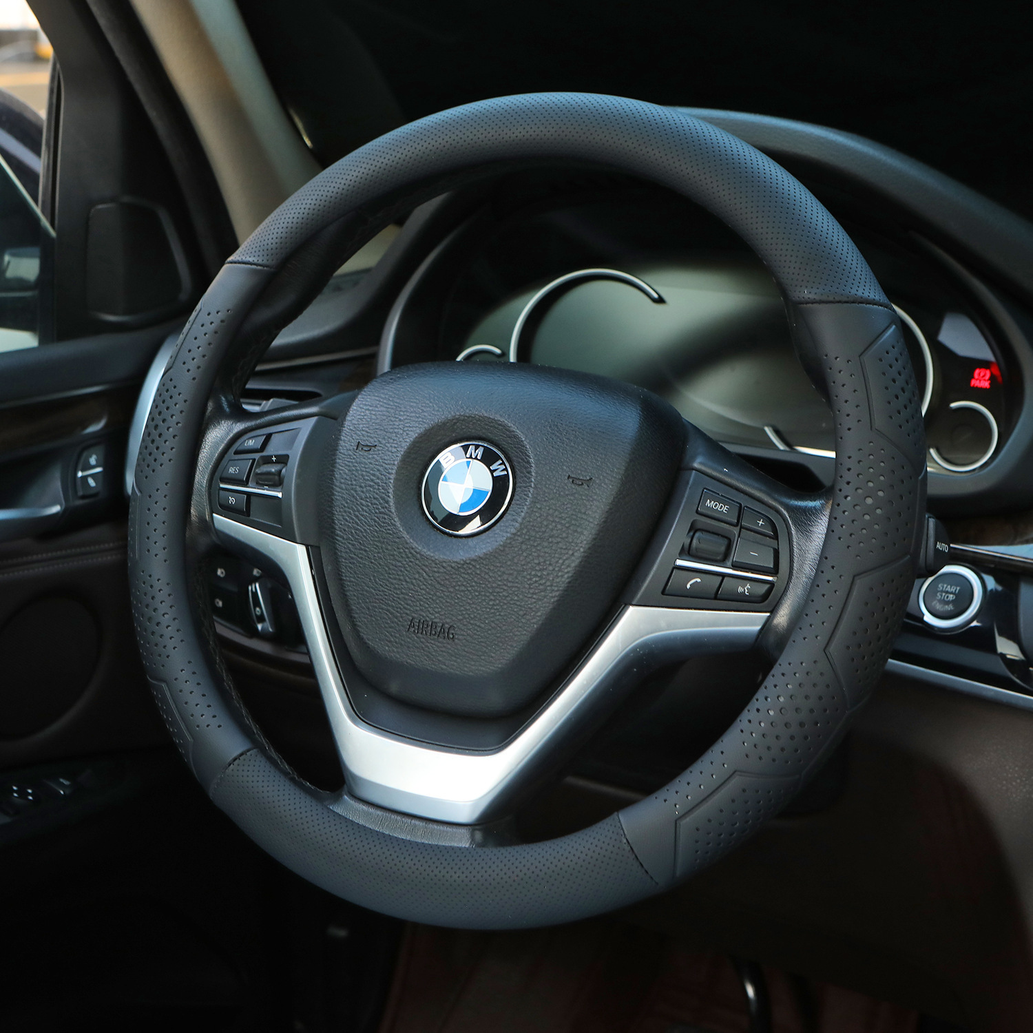 Amazon car steering wheel cover four seasons universal three-dimensional embossed elastic leather sports fashion car handle cover